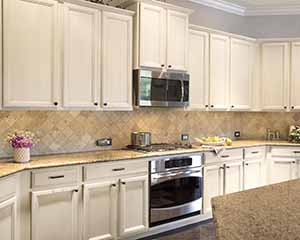 Glazed kitchen cabinets, Paper Moon Painting, San Antonio cabinet glazing and painting company