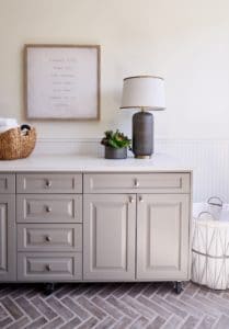 Laundry room cabinets in Benjamin Moore's BM 1552 River Reflections by Paper Moon Painting, cabinet painting