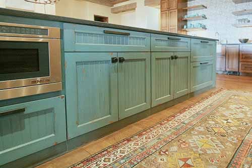 Farmhouse ranch kitchen, glazed cabinets antiqued island cabinet in blue