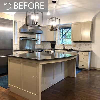 White kitchen cabinets before being painted by Paper Moon Painting