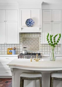 Alamo Heights kitchen cabinets painted by Paper Moon Painting in custom white