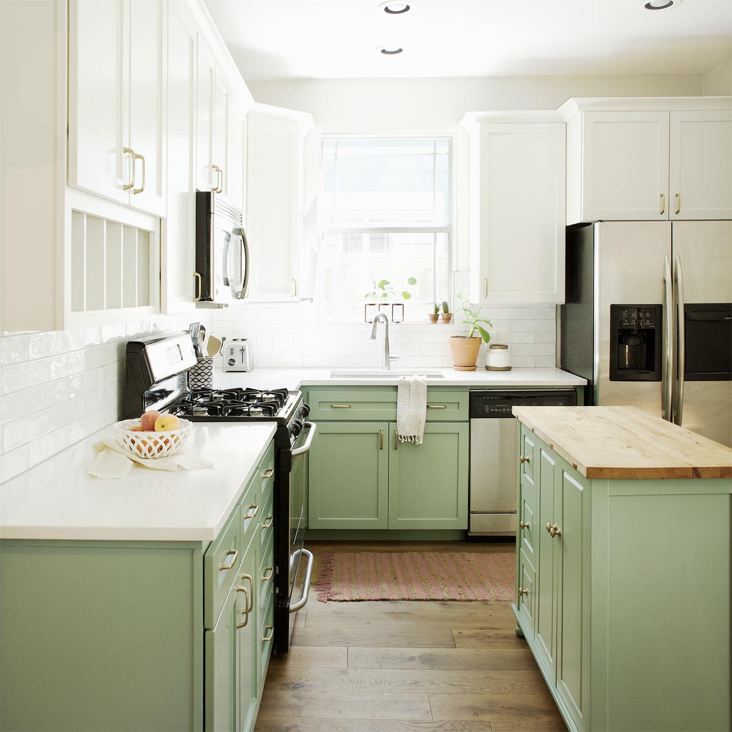 Green and white kitchen cabinets painted in BM Greenwich Village and SW Alabaster, Paper Moon Painting contractor, Austin