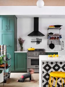 East Austin kitchen with Ikea cabinets painted in Benjamin Moore's 469 "Backwoods", Paper Moon Painting