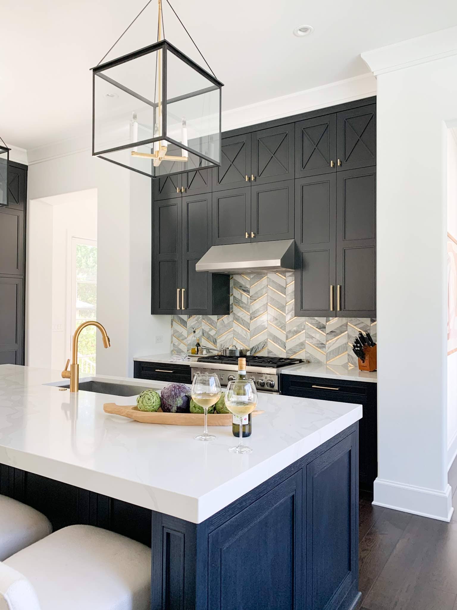 Black cerused kitchen cabinets, color affected by window light, Alamo Heights TX kitchen painting