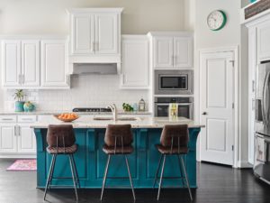 Two tone kitchen in Sherwin Williams Extra White, Benjamin Moore Naples Blue, San Antonio cabinet painting