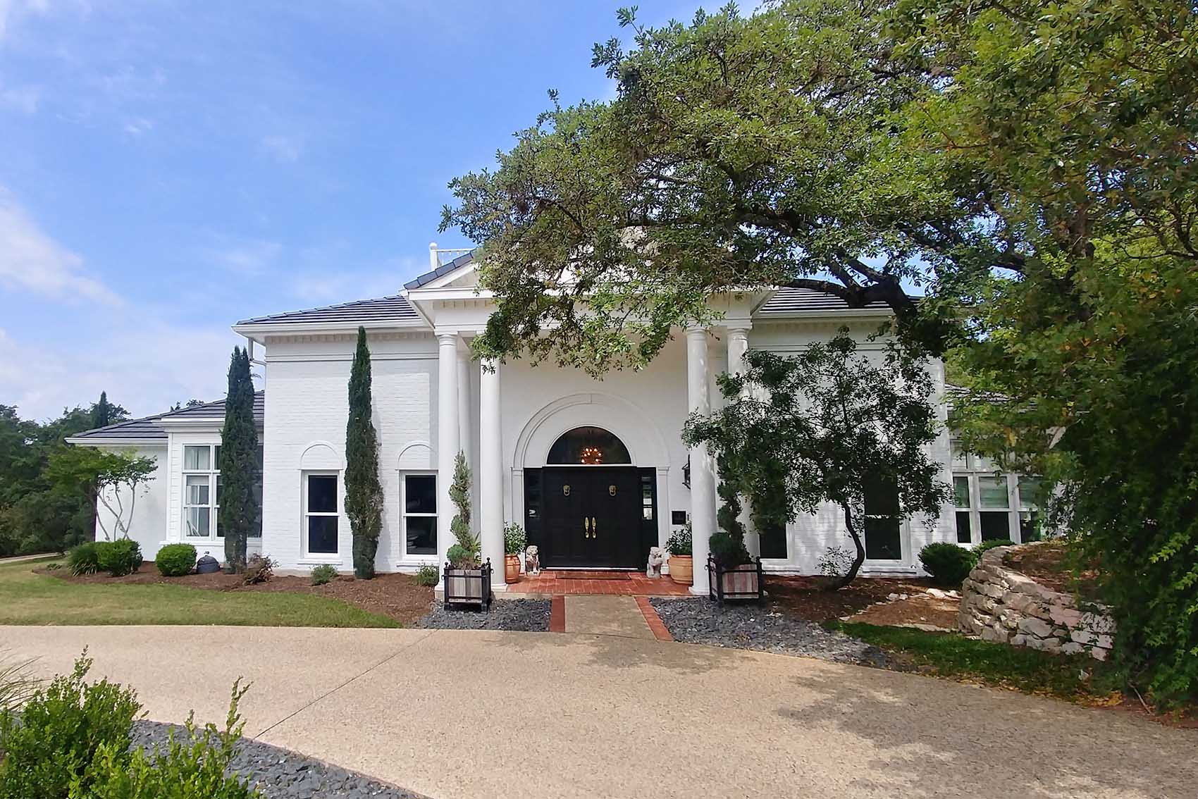 White painted brick exterior of home, Benjamin Moore OC-152 Super White, the Dominion, San Antonio, TX