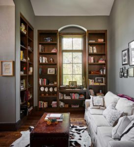 Home office with green gray walls and built-in bookshelves, Lake Austin TX, Paper Moon Painting