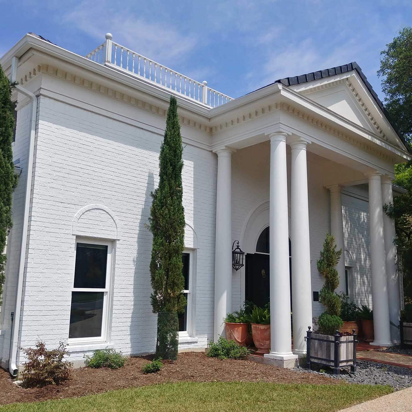 White painted brick exterior of home, Benjamin Moore OC-152 Super White, the Dominion, San Antonio TX