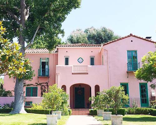 pink exterior stucco house, too bright