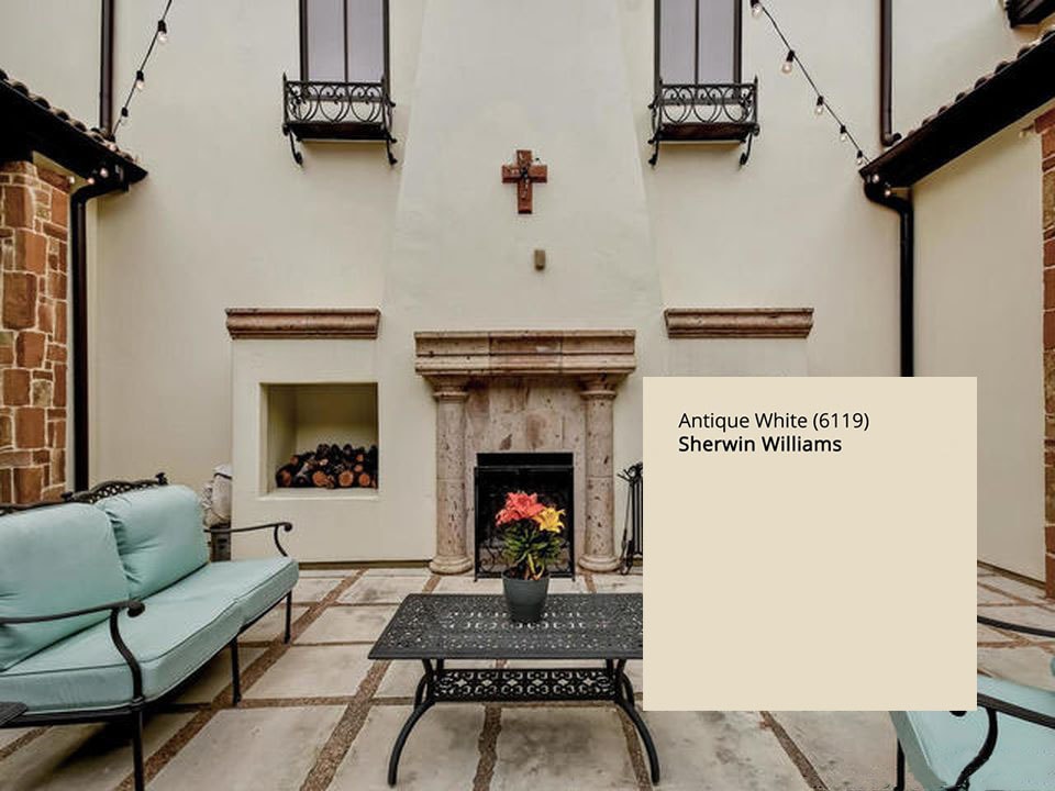 House exterior stucco paint in Sherwin Williams 6119 Antique White, yellow-beige, undertones in exterior paint colors blog