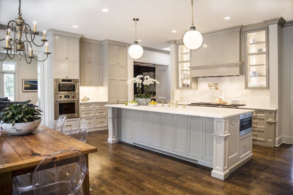 Kitchen cabinets with different colored crown molding