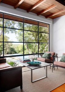 hill-country-ranch-house-paper-moon-painting-san-antonio-tx-home-painter-wood-beams-metal-window-plaster-sitting-area