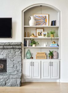 painted-built-in-bookshelves-in-sherwin-williams-light-french-gray-and-stone-fireplace-in-benjamin-moore-kendall-charcoal-austin-tx-home-painter-paper-moon-painting