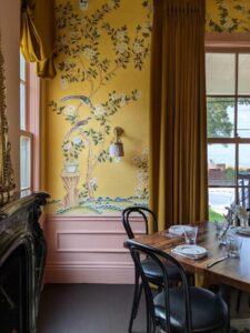 restaurant-claudine-yellow-gold-chinoiserie-wallpaper-san-antonio-tx