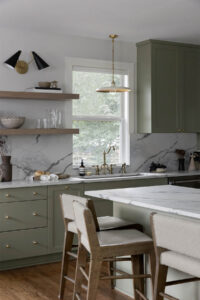 sage-green-kitchen-cabinet-paint-color-in-modern-kitchen-with-open-shelving