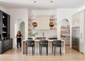 warm-modern-kitchen-for-studio-brownstone-with-cabinets-painted-in-benjamin-moore-inukshuk-smokey-taupe-and-sw-tricorn-black-by-paper-moon-painting-austin-tx