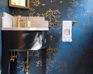 Dark blue wallpaper in guest powder bath, installation by Paper Moon Painting, Alamo Heights