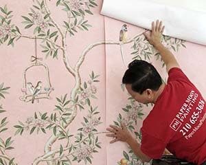 Pink Gracie hand-painted wallpaper installation by Paper Moon Painting wallpaper hanger, Austin